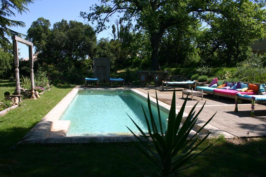 Bed and Breakfast Les Routes Du Monde Saint-Geniès-de-Comolas Exterior foto